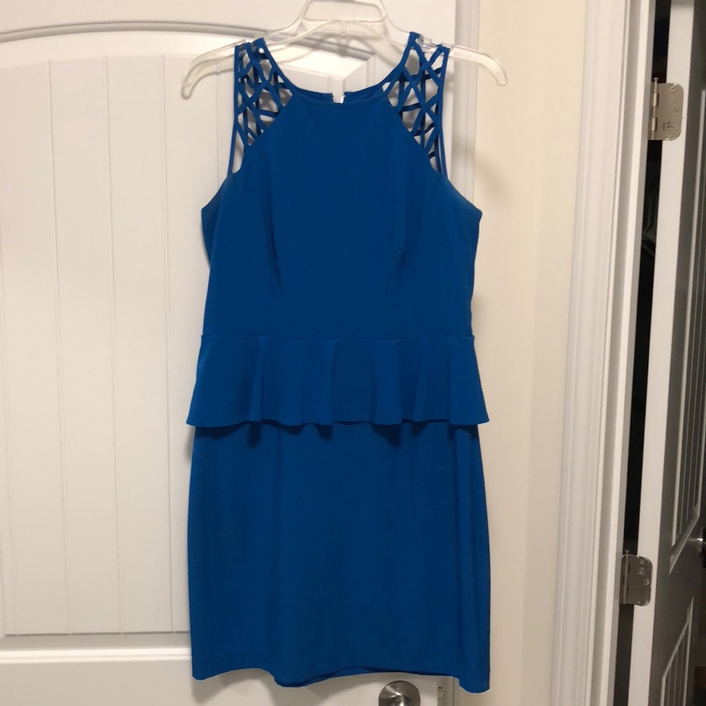 Vibrant BISOU BISOU peplum dress.
